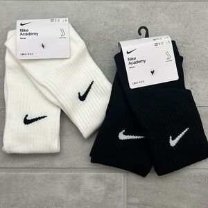 Bundle of black and white Nike soccer socks